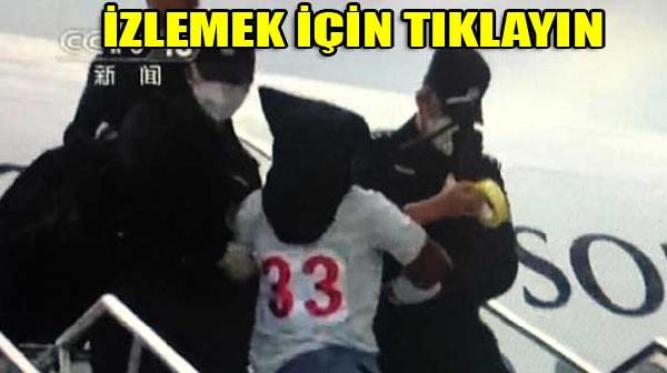 Uygur Türkleri Tayland'dan Çin'e başlarına çuval geçirilerek götürülmüş